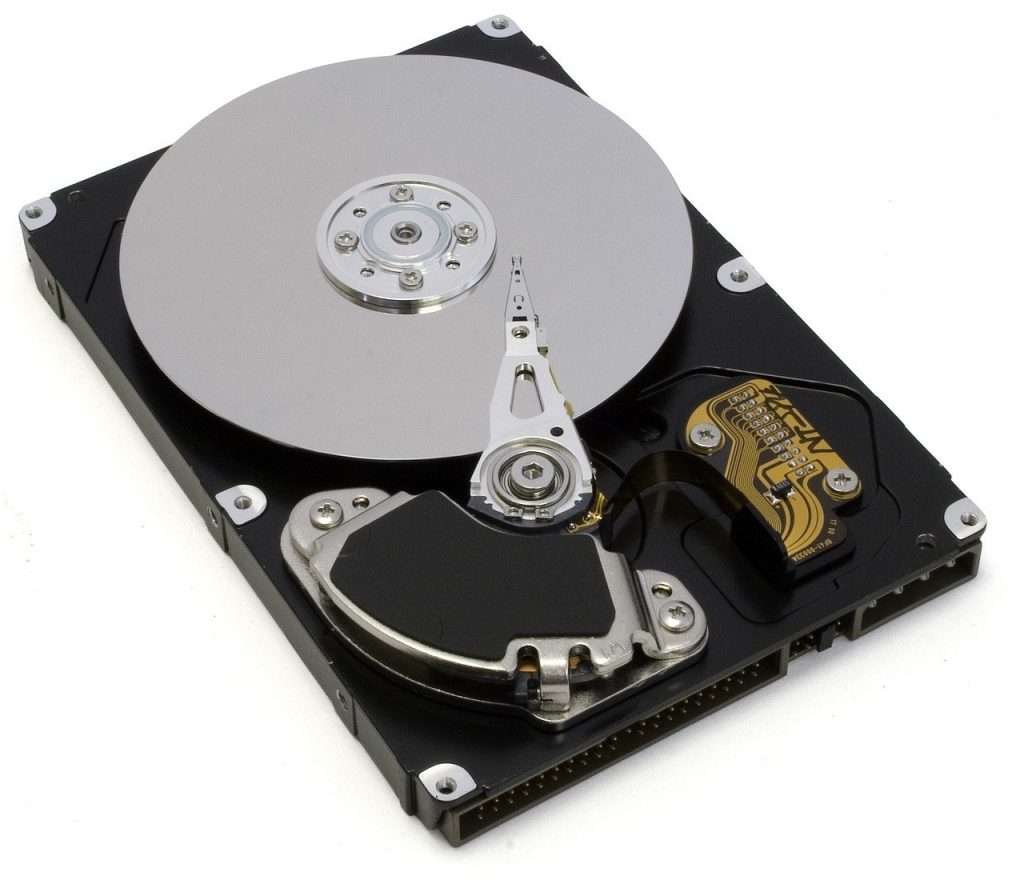 open hard drive, tray and visible playhead, writing